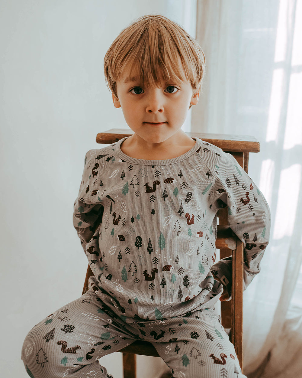 Boy wearing unisex organic cotton kids long-sleeve top