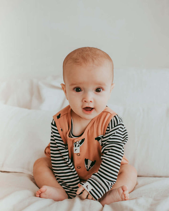 Baby wearing organic cotton baby romper