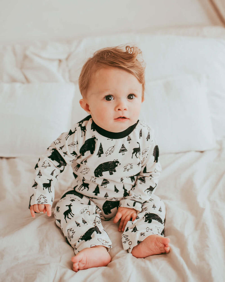 Baby wearing organic cotton printed baby playsuit