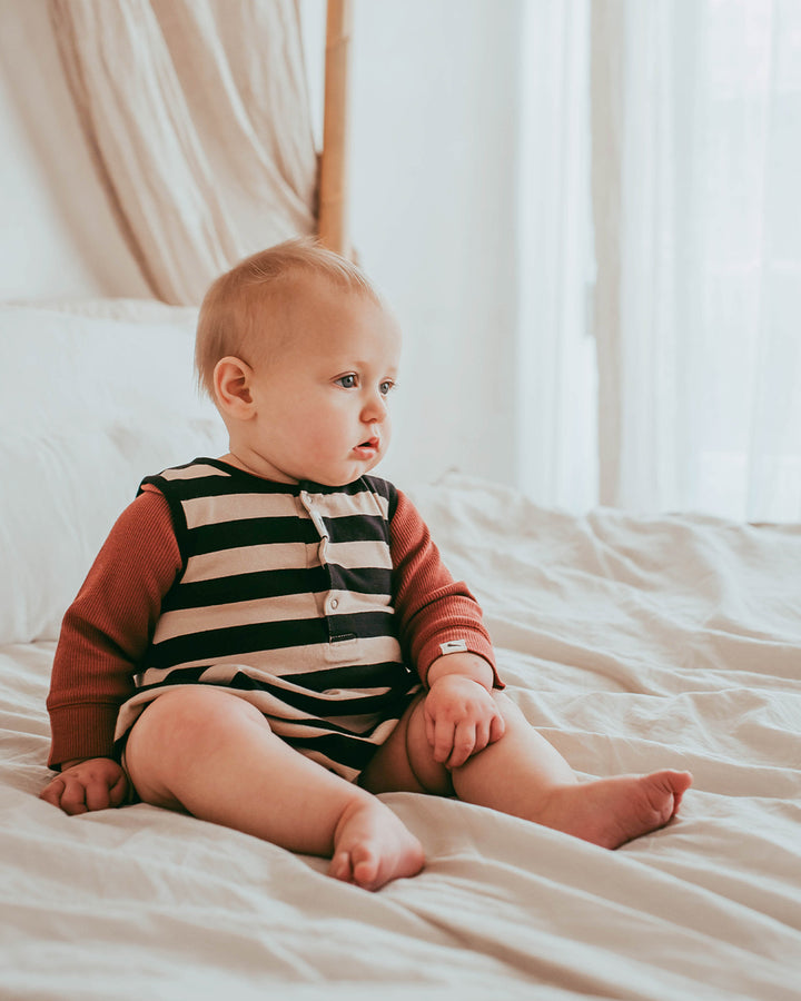 Baby wearing organic cotton stripe baby romper