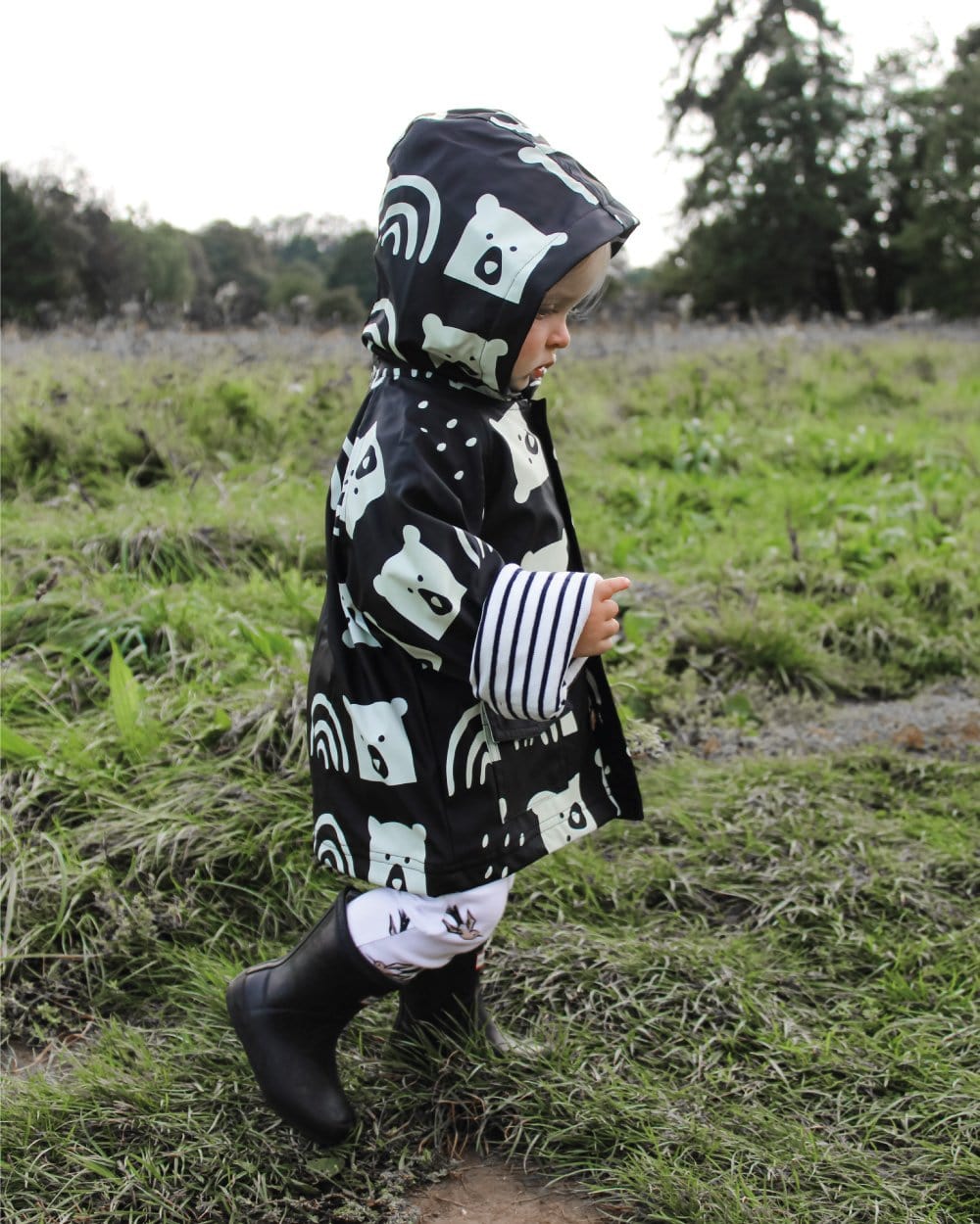 Boy wearing sustainable organic kids raincoat