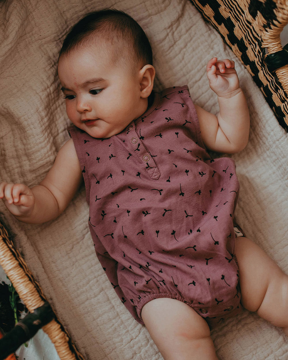Baby wearing organic cotton baby romper