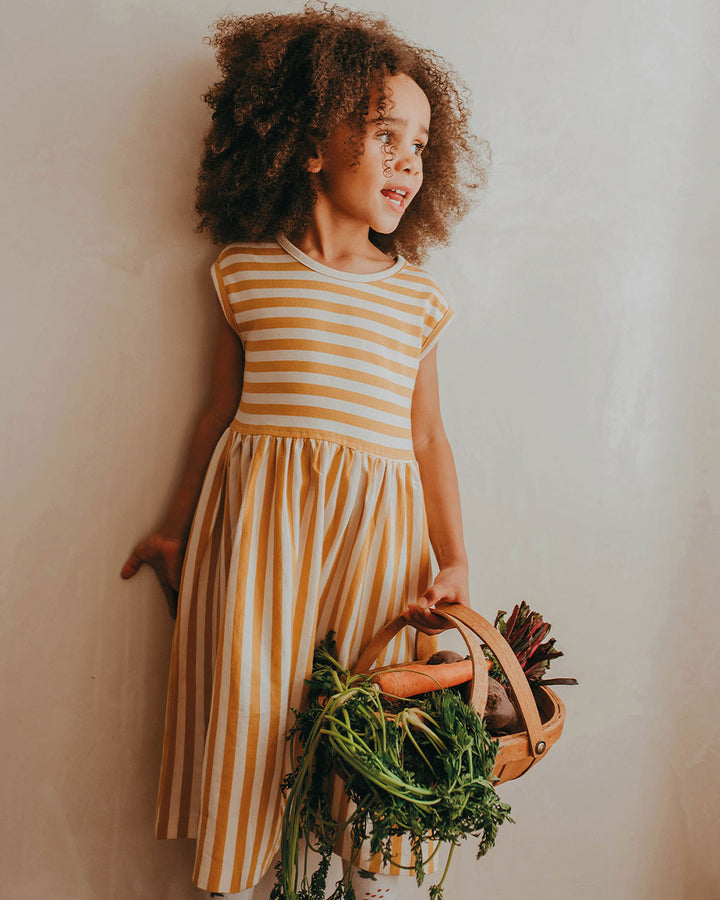 Girl wearing stripe organic cotton kids dress