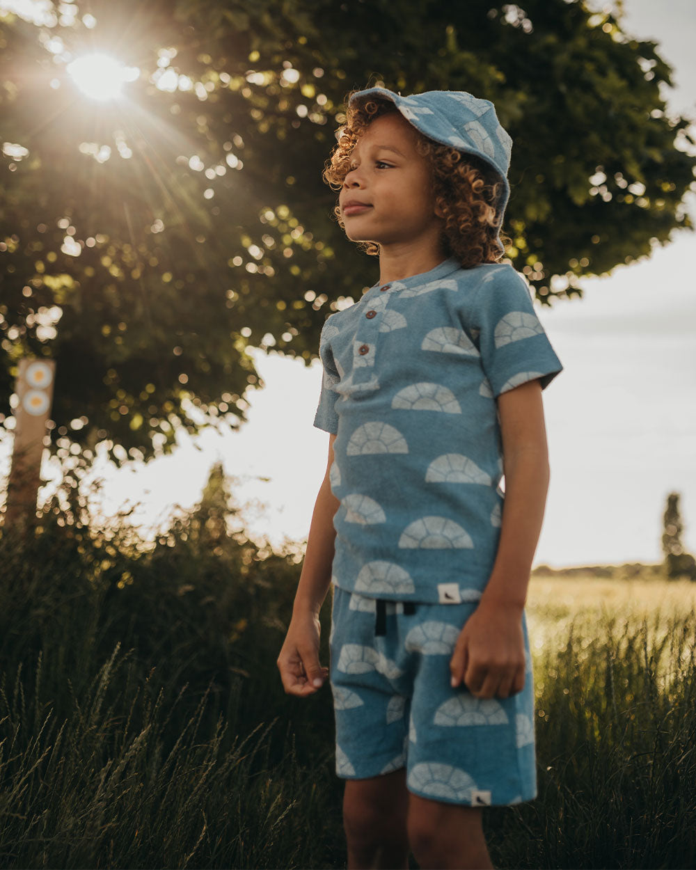 Boy wearing organic cotton terry kids short-sleeve top